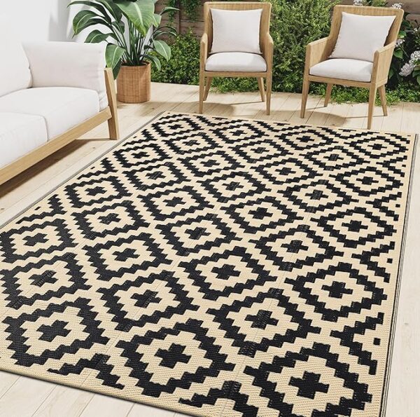 smiry outdoor rug in black and beige