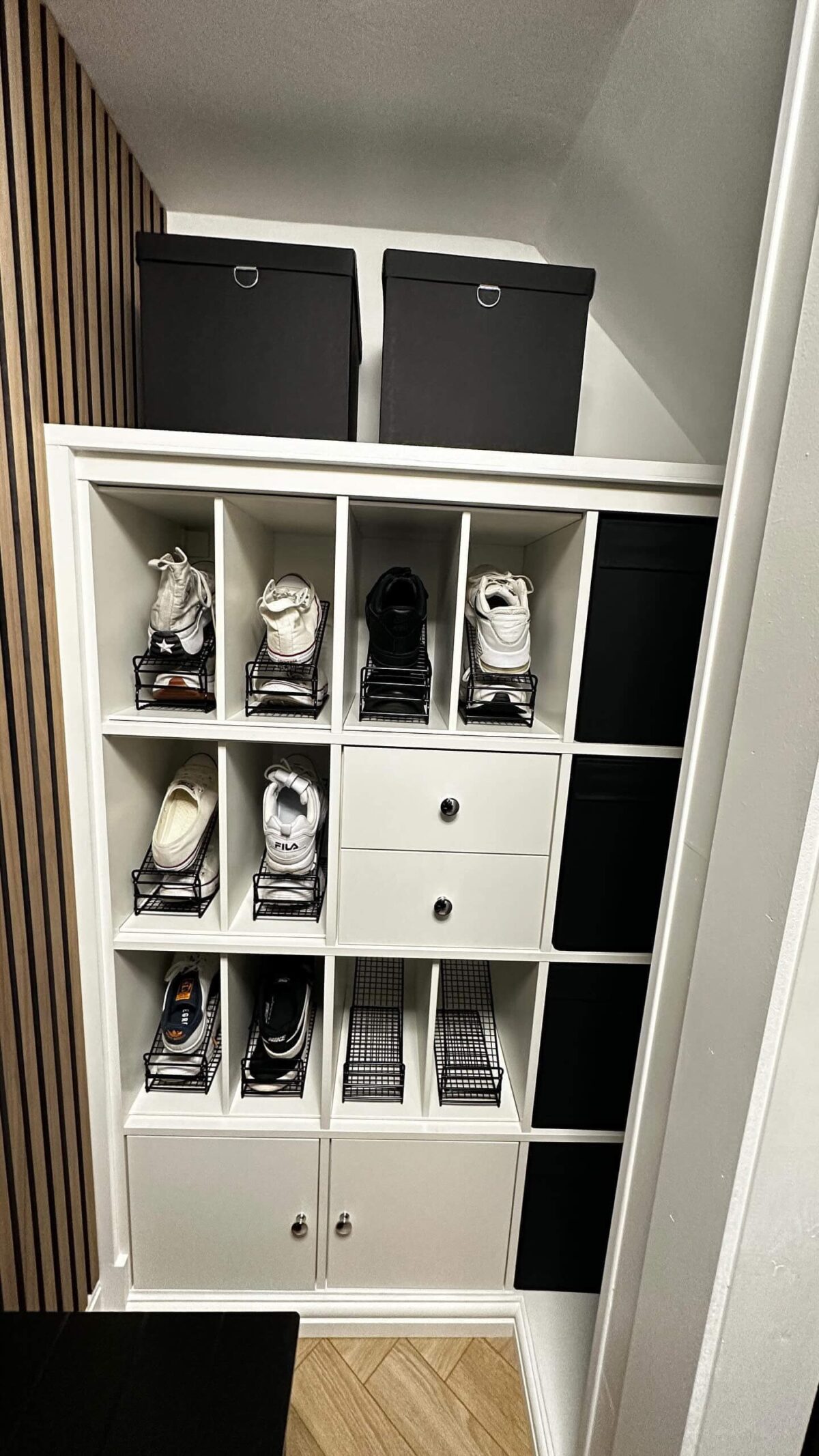 Use the IKEA KALLAX for shoe storage under the stairs
