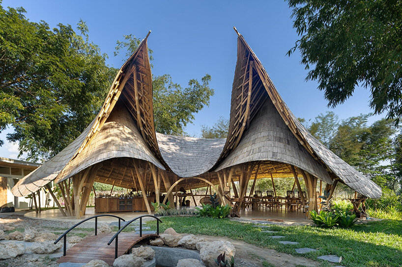 curved edges rise to form bull-like bamboo pavilion by chiangmai life architects in thailand