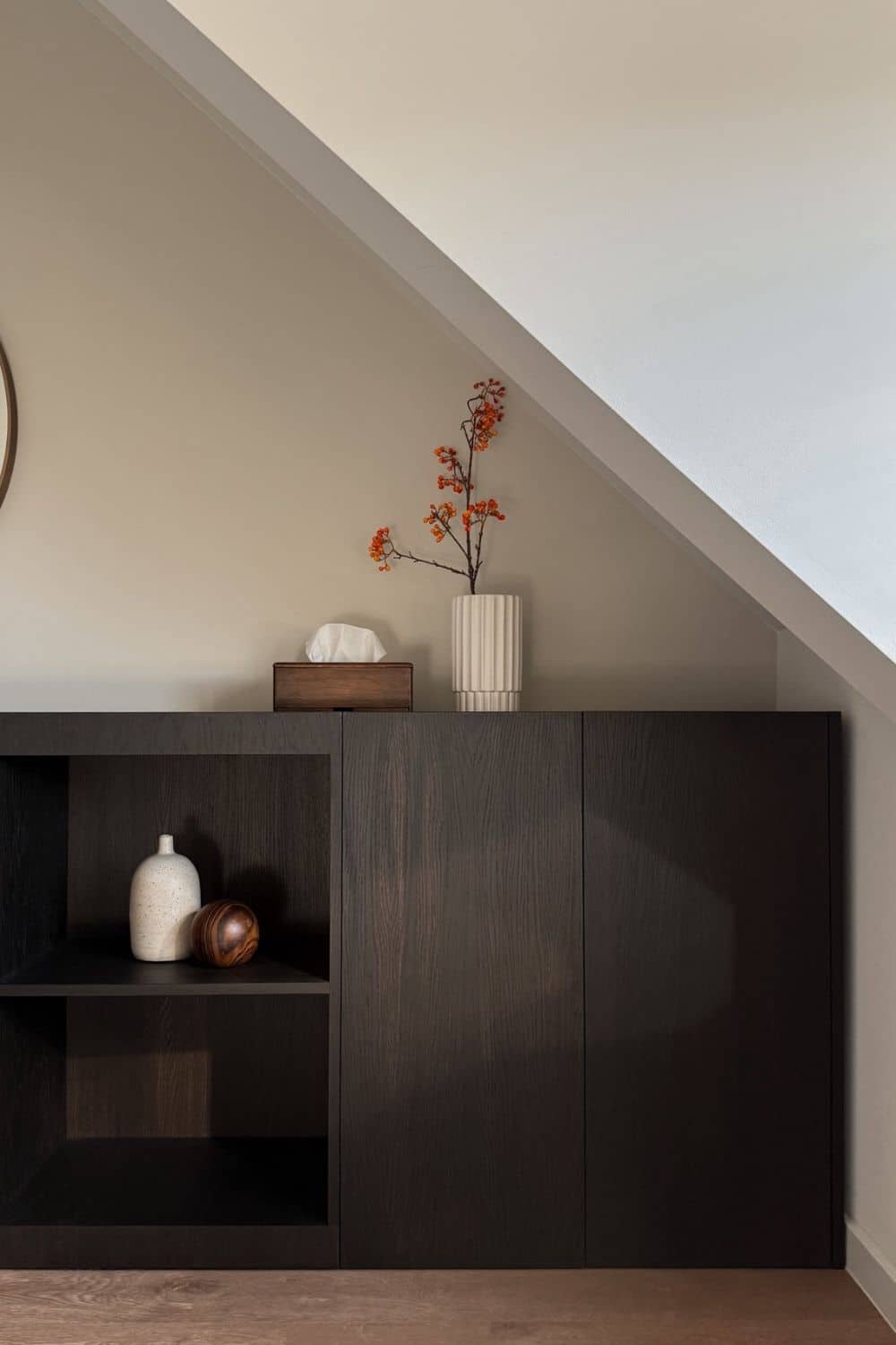 The IKEA Kitchen Cabinet Hack You’ll Use in Every Room 5 Finished IKEA METOD cabinet hack transformed into a modern wood storage console with hidden storage and open shelves, styled in a bedroom.