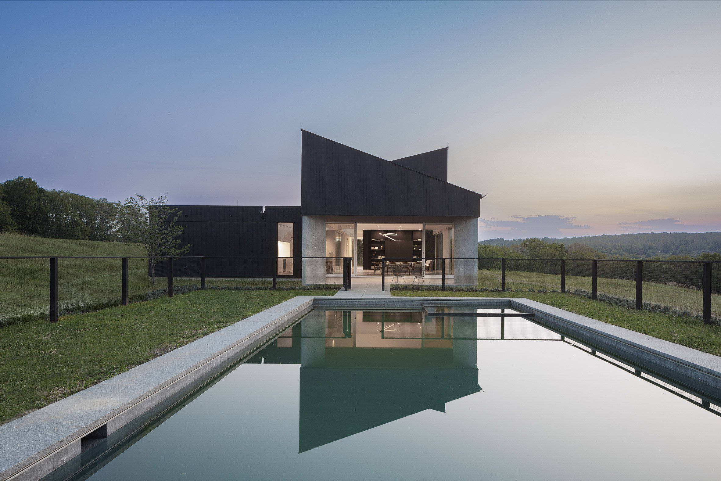 Swimming pool with black house
