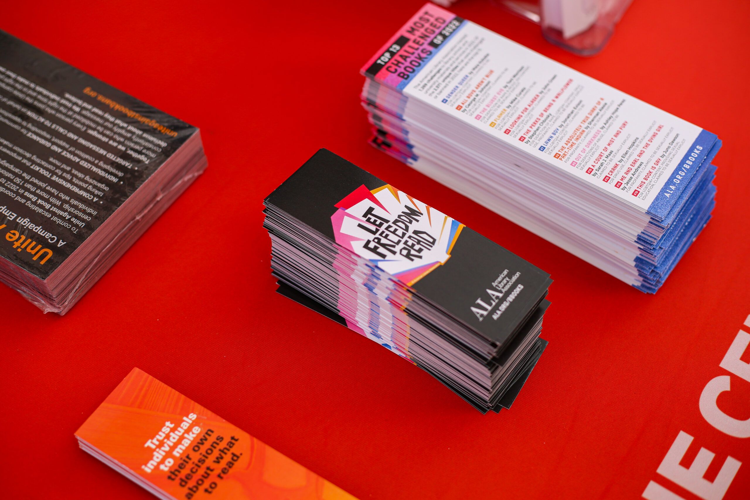 a table with Let Freedom Read bookmarks