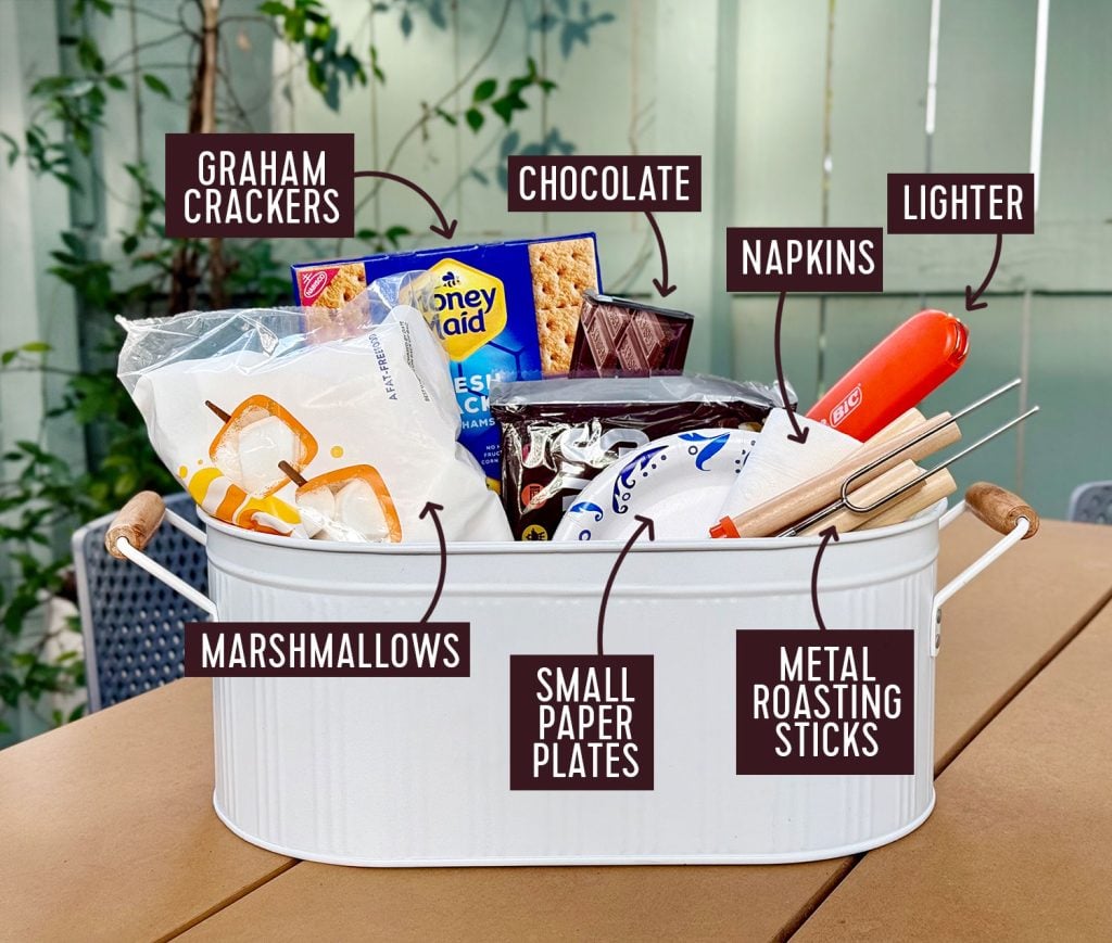 Smores Supply Kit In Metal Tin With Ingredients Lighter Plates Napkins And Metal Roasting Sticks