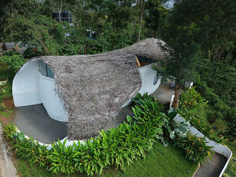 organic shell roof made of thatch and mud tops sculptural eco-retreat in india