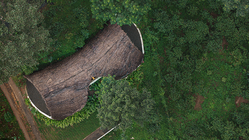 organic shell roof made of thatch and mud tops sculptural eco-retreat in india