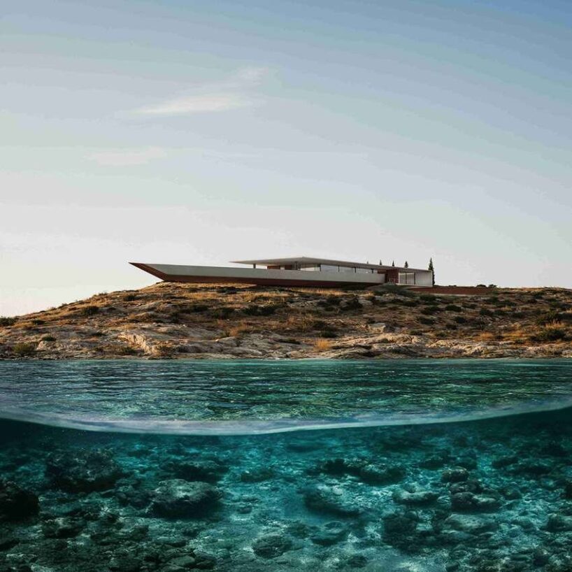summer residence's sharp geometry emerges from greek seaside slope