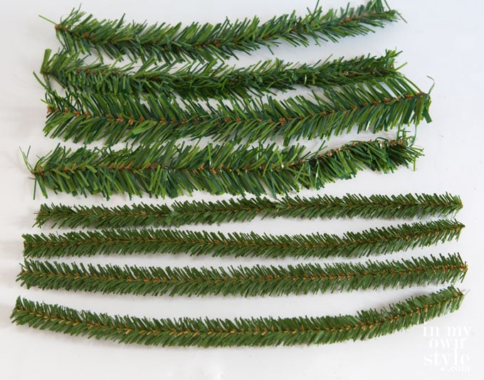 Two types of Christmas garland ties that look like pine branches.
