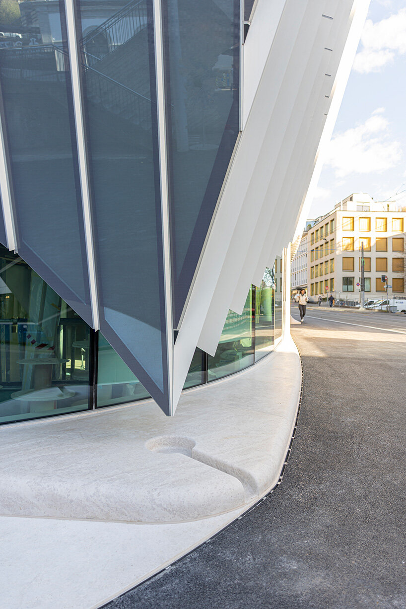 santiago calatrava sculpts haus zum falken in zurich with folded glass facade